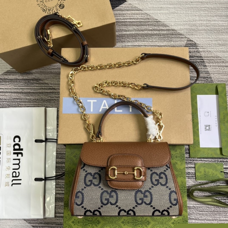 G*u*i top handle bags